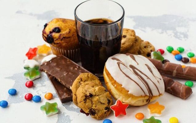 Sugary treats and beverages to avoid with orthodontic braces for dental health.